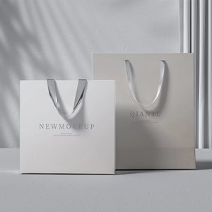 ถุงกระดาษสีขาวสั่งทำขายส่งพร้อมหูหิ้วแบบพรีเมียม ถุงช้อปปิ้งหูหิ้วแบบบิด บรรจุภัณฑ์สำหรับร้านค้าปลีกพร้อมแบรนด์ - Product Image 1