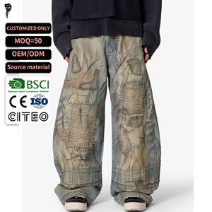 Jean en denim délavé pour homme, style vintage, patchwork, déchiré, coupe ample, jambe large, personnalisable OEM - Product Image 1