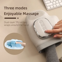 Gants de massage électriques vibrants sans fil OEM en gros avec compression d'air pour les mains et les doigts