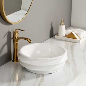 Fregaderos de baño de lujo Best Wash Lavabo de mano Baño Moderno forma especial Lavabo dorado - Product Image 2