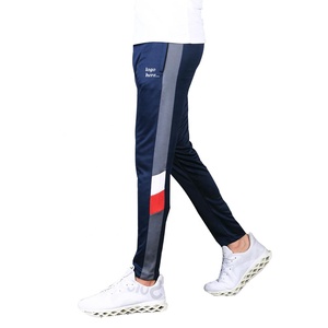 Parte inferior de secado rápido azul marino con blanco rojo - Product Image 1