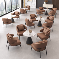 Ensemble de meubles de luxe moderne, fauteuil lounge en cuir PU orange, table ronde en pierre frittée, mobilier commercial pour hôtel