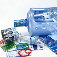 Étiquette thermorétractable en PVC personnalisée, haute transparence, durable, scellage sécurisé, impression couleur, forme personnalisée pour bouchon de bouteille d'eau minérale