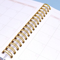 Carnet à spirale Manifeste Journal Logo d'impression personnalisé Couverture rigide A5 Agenda quotidien et carnet Feuille d'or Planificateur en relief