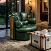 Fauteuil pivotant vintage de style mid-century, en cuir véritable, avec accoudoirs décorés de rivets en laiton, fauteuil de salon rond pour la détente