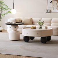 Table basse de style crème pour un salon minimaliste, petit appartement, table basse ronde moderne, simple et haut de gamme