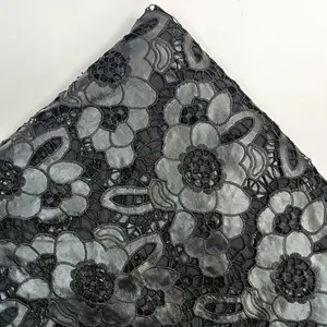 Tela bordada de corte láser de PU de encaje de ganchillo geométrico negro directo de fábrica de 2017 para vestido