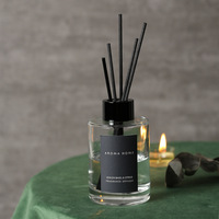 Bouteille d'huile d'aromathérapie personnalisée de 50ml 100ml 150ml bouteille en verre diffuseur de roseau rond décoratif avec emballage de luxe