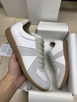Chaussures de marque de qualité supérieure en cuir véritable, plates et décontractées pour hommes et femmes, sportives, élégantes, à lacets, confortables pour la marche