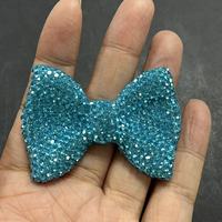 En gros, breloques de luxe scintillantes avec motifs nœud, signe du dollar, rose, rouge, bleu, noir, argenté, pour coques de téléphone, coques d'iPad, style Kawaii et artisanat DIY