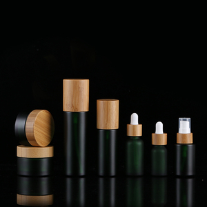 Flacon de lotion en verre <span class=keywords><strong>noir</strong></span> mat de 100 ml de qualité supérieure, pompe en <span class=keywords><strong>bambou</strong></span>, emballage cosmétique en bois naturel - Product Image 3