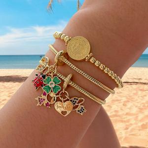 Bracelet <span class=keywords><strong>BD</strong></span>-L5505 plaqué or avec émail et incrustations de zirconiums, breloque médaille religieuse, trèfle, coccinelle, pour femme, fille et garçon - Product Image 1