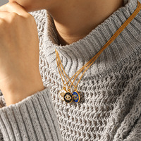 YYN ODM Collier unisexe en acier inoxydable plaqué argent avec pendentif œil bleu en strass et chaîne croisée 45cm Anniversaire