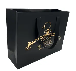 Emballage de luxe imprimé étiquette privée réutilisable petits sacs en papier cadeau de noël Logo personnalisé avec poignées en ruban