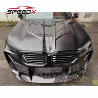 Kit carrosserie en fibre de carbone Mansory pour BMW XM : Lame avant XM, diffuseur de pare-chocs arrière, jupes latérales, élargisseurs d'ailes, spoiler