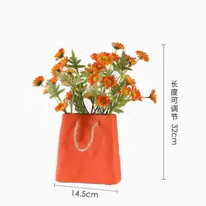 seramik heykel kil Suppliers-İskandinav vazo yüksek kaliteli masa üstü ev dekor seramik çiçek vazo 2022 son tasarım çanta Vasen zarif avrupa seramik el sanatları
