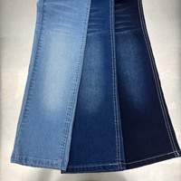 Tela vaquera elástica azul por delante y negra por detrás de 8.4oz de algodón, viscosa y spandex para shorts de mezclilla al por mayor