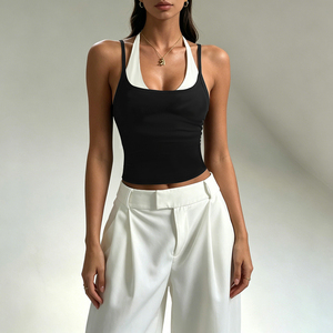 Top corto casual de punto sin mangas con cuello halter y lazo, ajustado, elástico, de dos piezas simuladas, liso, en blanco y negro, para mujer - Product Image 1