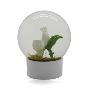 Lucky flower 80mm resin glass snow globe custom White flower sculpture water globe home decor