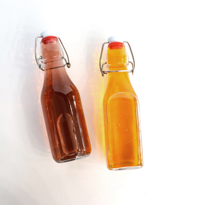 Vente en gros 250ml 500ml 750ml 1L Bouteille en verre transparent avec couvercle hermétique Swing Top Boissons Jus Bouteilles rondes en verre - Product Image 4