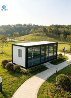 Maison conteneur préfabriquée en kit avec grande fenêtre vitrée, bureau conteneur modulaire et portable pour hébergement sur chantier