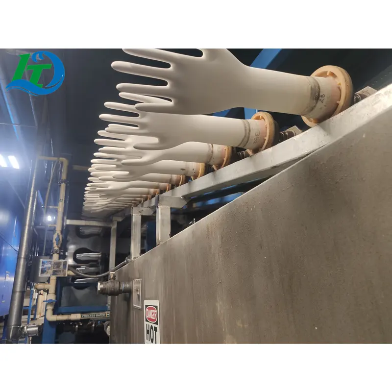 HuiGang: Máquina automatizada de fabricación de guantes para un proceso de producción aerodinámico