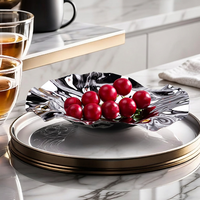 Noordse minimalistische luxe fruitschaal van 304 roestvrij staal met onregelmatige vorm, geschikt voor gedroogd fruit, perfect voor een housewarming.