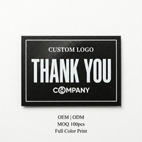 Cartes de remerciement minimalistes noires avec typographie blanche audacieuse, style industriel cool, personnalisables en gros, logo sur mesure, emballage pour entreprises et vente au détail, OEM ODM