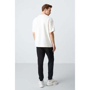 Conjunto Deportivo de Algodón Blanco y Negro para Hombre, Corte Holgado, Casual, Textura Suave, Pantalones Joggers Básicos, Estilo Adulto - Product Image 1