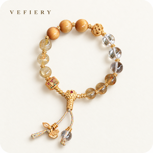 Pulsera de cuentas mixtas en tonos marrones y transparentes con detalles en tono dorado y borla de cordón - Product Image 1