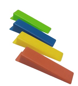 Cheap tile leveling system contain spacer clips and wedges used between two tiles to ensure the height and gaps same
