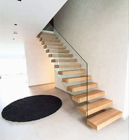 Escalier flottant moderne d'intérieur de haute qualité avec poutre en acier droite et garde-corps à câbles