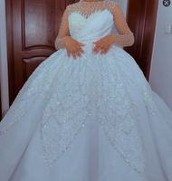 Robe de mariée élégante à manches longues avec perles 2026 |   Robe de bal en tulle volumineux avec corsage plissé orné de paillettes pour femmes noires