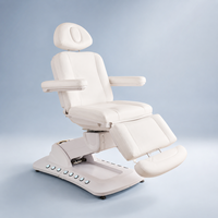 Table de massage électrique pliable de luxe en acier inoxydable réglable avec repose-pieds pour salon, spa et soins de la peau