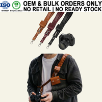 Sangle de cou/d'épaule pour appareil photo en cuir véritable OEM avec pochette de rangement pour cartes SD pour les photographes professionnels et amateurs