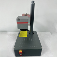 Machine de marquage laser UV de bureau refroidie à l'eau 3W 5W pour le marquage du plastique, du verre et du métal