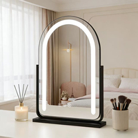 Miroir de maquillage intelligent à cadre métallique arqué avec interrupteur tactile LED pour anniversaire et mariage