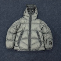 Veste d'hiver rembourrée en duvet 100% avec capuche et fermeture éclair pour homme, de la marque CP Luxury, style hip-hop haut de gamme.