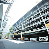 Structure de parking en acier préfabriquée à plusieurs niveaux avec interface de borne de recharge intégrée pour les véhicules à énergie nouvelle