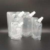 Emballage en plastique 250ml 200ml 100ml Sac de poche à bec imprimé liquide transparent transparent