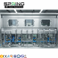 Ligne de production d'eau pure en bouteille de 20 litres (5 gallons) entièrement automatique 150-2000 BPH avec machine de remplissage