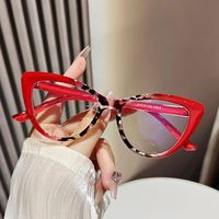 Lunettes de vue optiques tendance vintage 2025 avec logo personnalisé, lunettes de protection anti-lumière bleue colorées de style œil de chat pour femmes
