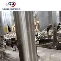 Machine de remplissage et de bouchage automatique électrique d'occasion 4000 bph pour jus avec pulpe, en stock, vente chaude