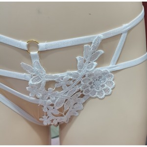 Culottes sexy européennes et américaines pour femmes, à fleurs, solubles dans l'eau, transparentes, lingerie séduisante. - Product Image 1