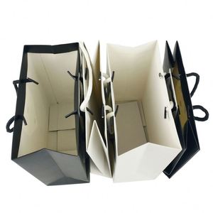 Sacs en papier à provisions en carton blanc de luxe de conception personnalisée en Chine avec smoking noir créatif pour les petites entreprises - Product Image 3