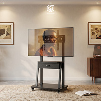 Prix Compétitif Usine – Chariot TV Mobile Réglable en Hauteur (32-75 Pouces) avec Tiroir – Support TV Roulant – Personnalisation Acceptée