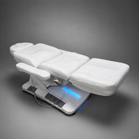 Lit de beauté électrique multifonctionnel de luxe réglable à 4 moteurs pour soins du visage, spa, massage, salon de tatouage