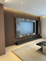 Panneau mural WPC de grande taille avec texture de pierre travertin pour projets d'aménagement intérieur commercial