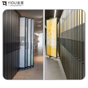 कस्टम स्टोन पुश पुल और शोरूम डिजाइन के साथ प्रीमियम स्लाइडिंग कक्षीय स्लैब रैक - Product Image 2