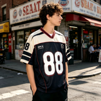 Maillot de football rétro en gros ODM, en maille patchwork, sérigraphie, numéro et logo personnalisés, col en V, style streetwear